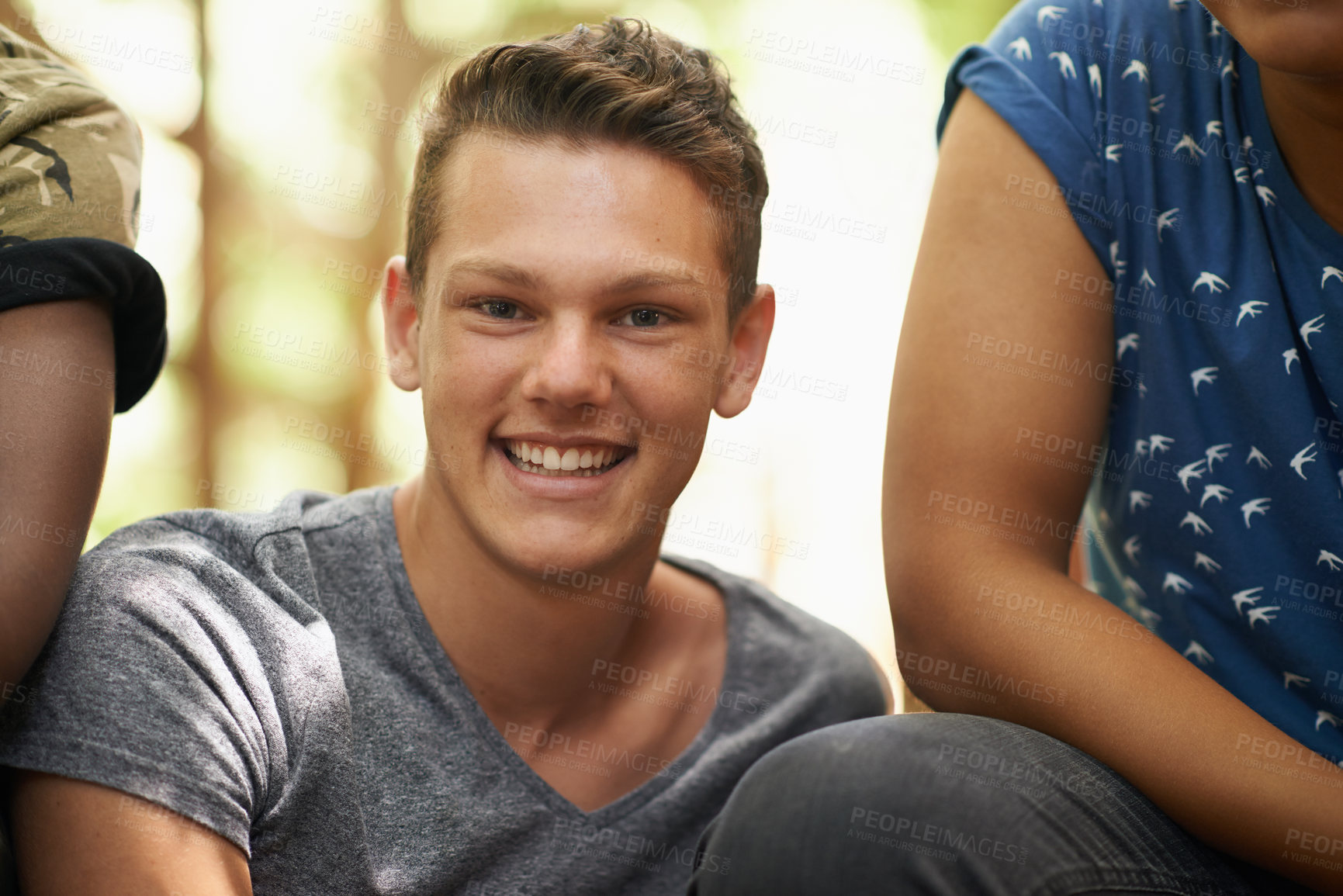 Buy stock photo Happy, nature and portrait of boy with friends on adventure, vacation or holiday together. Smile, travel and face of young teenager with people in outdoor park, garden or field on weekend trip.