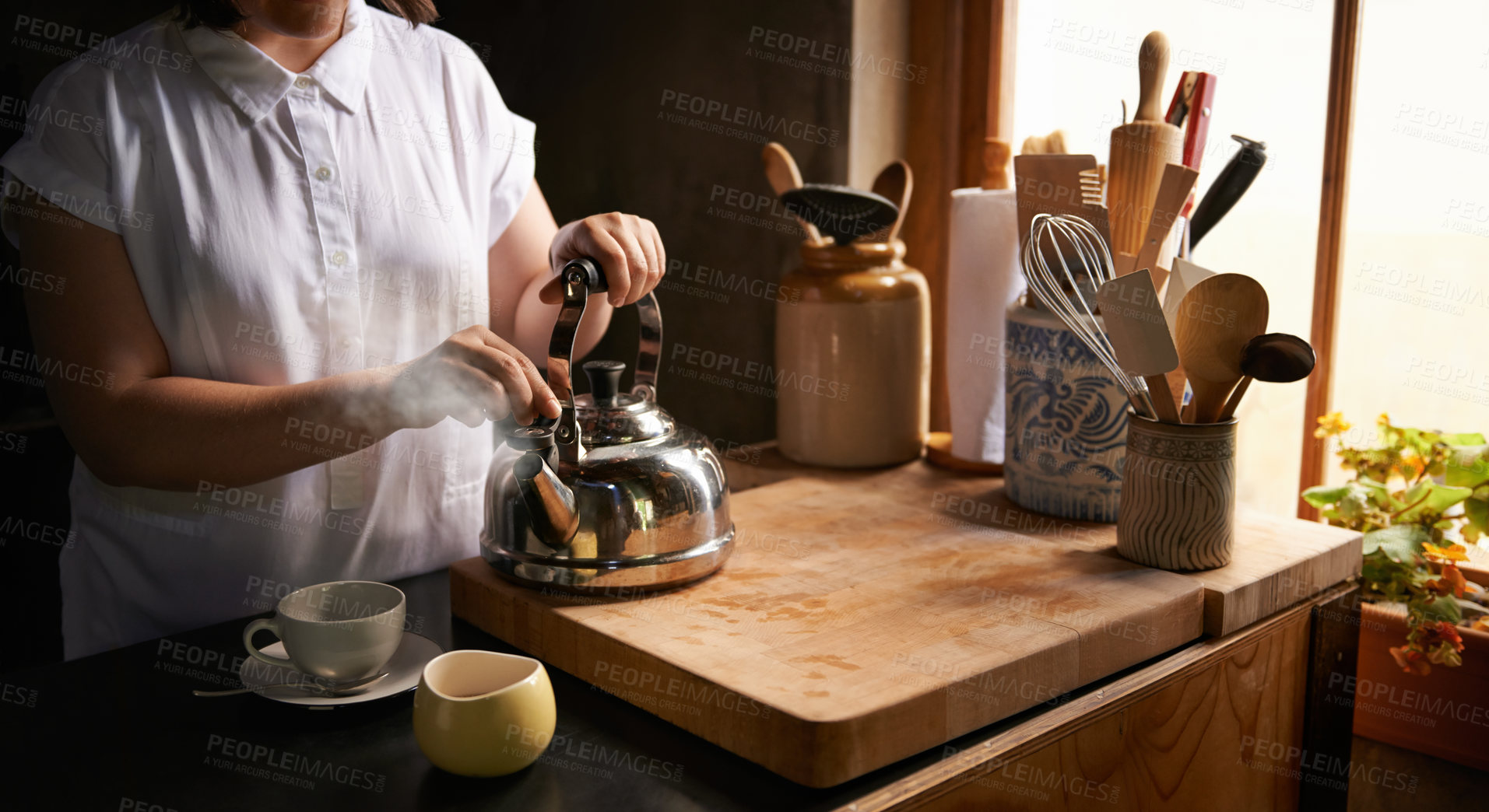 Buy stock photo Prepare, tea and morning in kitchen with hands on kettle for routine process in home. Healthy, matcha or person in house with breakfast beverage to start holiday or vacation and relax with drink