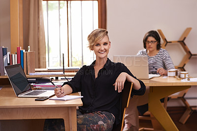 Buy stock photo A cropped shot of two women working in a home office