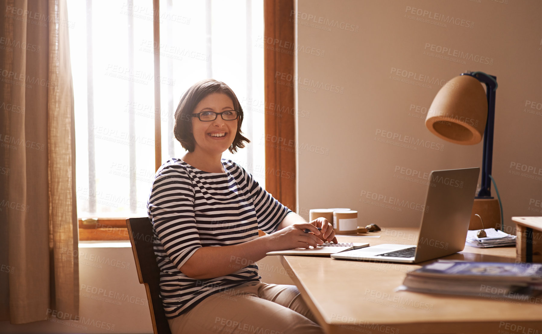 Buy stock photo Portrait, businesswoman and positive in home office with confidence, laptop and freelancer with notes for project. Face, entrepreneur and smile for wellness and online research in startup company
