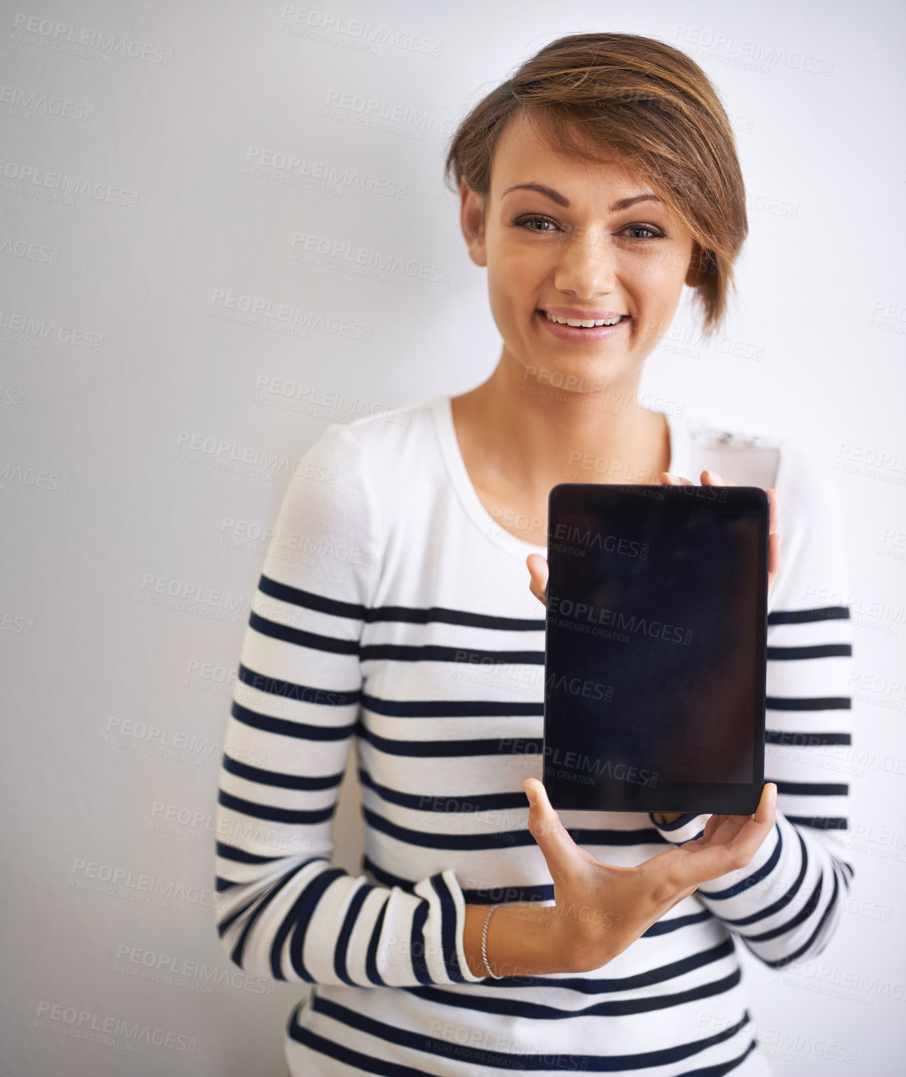 Buy stock photo Teen, studio or portrait with tablet, mockup and screen for social media or communication. Girl, app and smile with technology, online connection or internet message isolated on white background