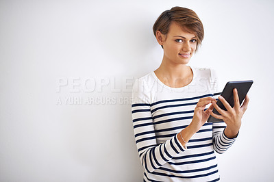 Buy stock photo Woman, studio or portrait with tablet, browsing and face for social media or communication. Girl, tech and smile with technology, online connection or internet message isolated on white background