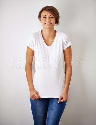 Buy stock photo Portrait, fashion and smile with trendy woman in studio on white background for casual or relaxed style. Model, happy and clothes with confident young person in clothing outfit for natural chic