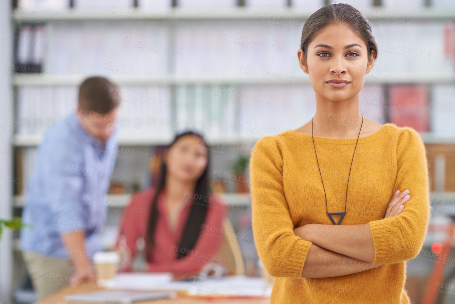 Buy stock photo Creative, portrait and confident woman in office for startup company or agency, plan and designer for advertising business. Female person, arms crossed and employees, proud and together for teamwork.