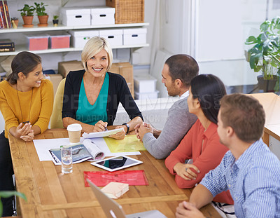 Buy stock photo Senior woman, leadership and meeting for planning, collaboration and strategy in office of startup company. Management, smile and diverse group of people for discussion, idea or teamwork in workplace