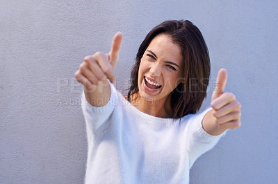 Buy stock photo Thumbs up, hands and portrait of woman with winner, success and goal or approval isolated on gray background. Happy, female person and gesture for yes, ok and achievement with smile in studio