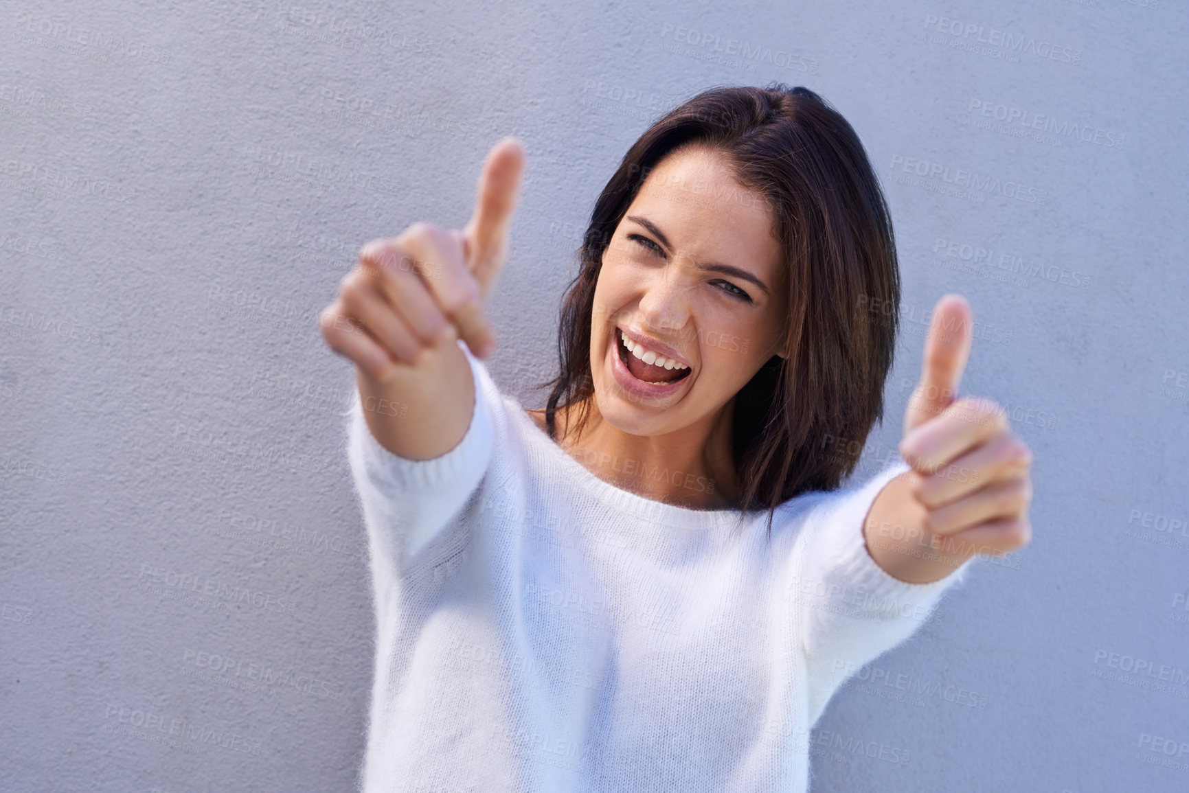 Buy stock photo Thumbs up, hands and portrait of woman with winner, success and goal or approval isolated on gray background. Happy, female person and gesture for yes, ok and achievement with smile in studio