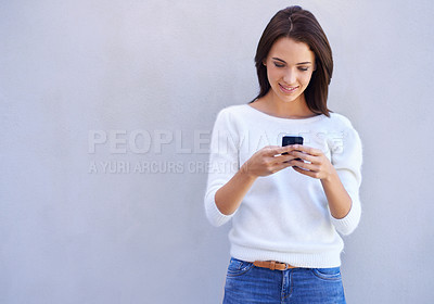 Buy stock photo Happy, woman and smartphone typing, casual female person on social media for browsing and information search. Internet, online reading and web connection for communication and technology device
