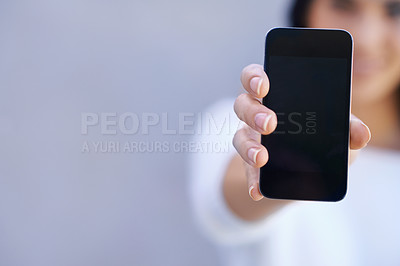 Buy stock photo Presentation, mockup and phone on hand in studio background for product placement. Digital, female person and girl advertising for mobile or smartphone, technology and connection to internet