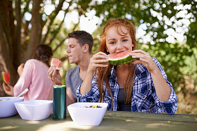 Buy stock photo Portrait, watermelon and teenager eating with friends in morning for breakfast with happiness. Spring, girl and female person in park with group for picnic to eat fruit as healthy food and outdoor