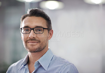 Buy stock photo Cropped portrait of a businessman standing in an office