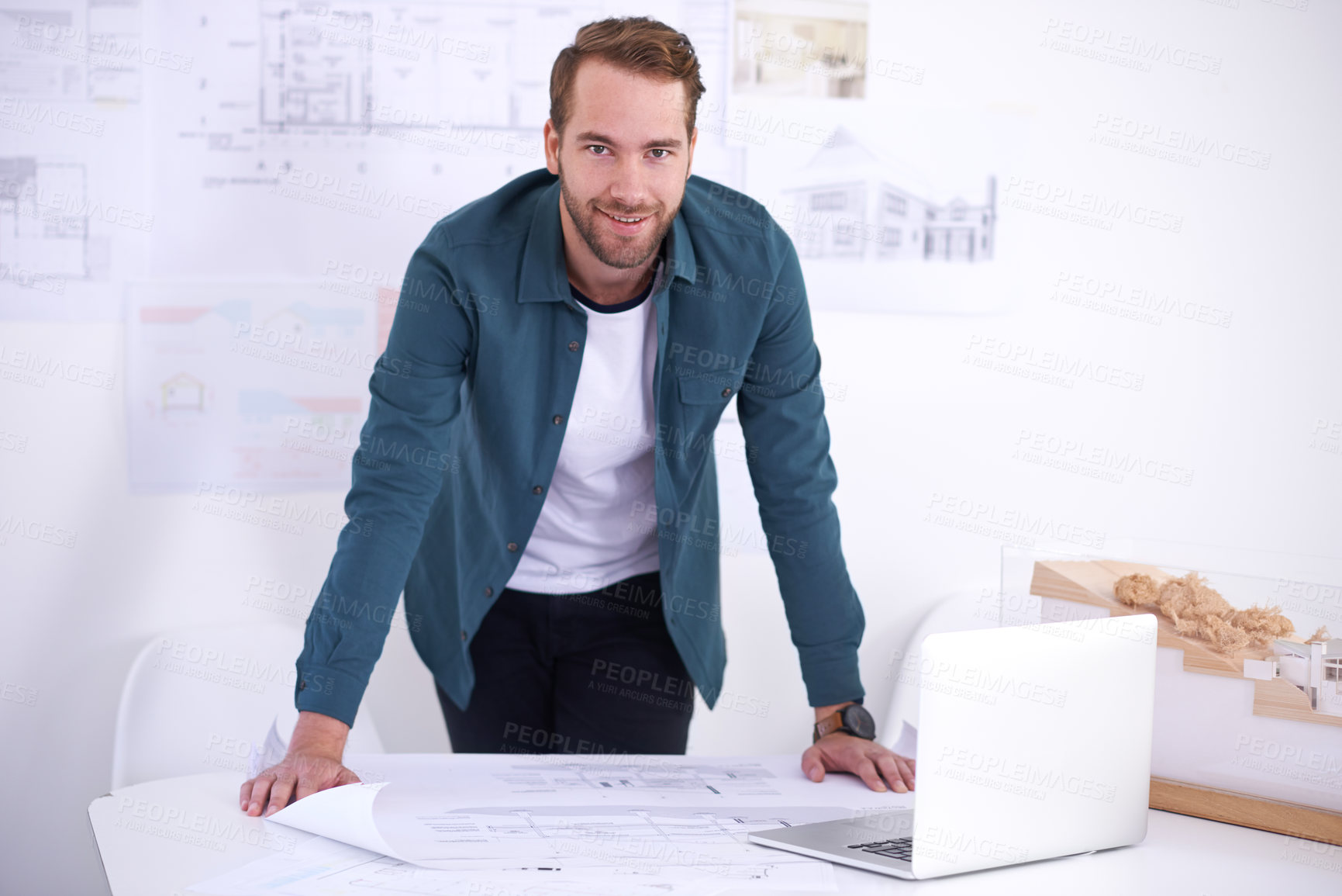 Buy stock photo Portrait, laptop and layout with architect man in office with documents for building, construction or design. Architecture, construction and blueprint with confident young developer in workplace