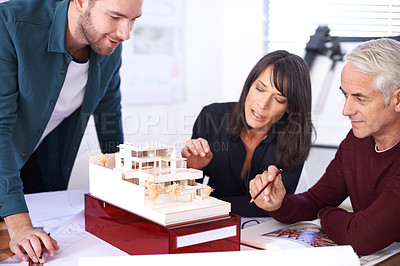 Buy stock photo Team, architect and collaboration with model for building, house and planning together at workspace. Engineer, group and partnership working on meeting, thinking and idea of design for construction
