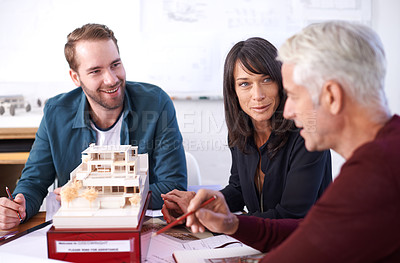 Buy stock photo Architects, collaboration and smile with building model, 3d design and development with colleagues. Remodeling, construction and planning in office, contractor or property developer for project