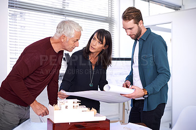 Buy stock photo Architects, blueprint and teamwork with building model, design and development with colleagues. Smile, remodeling and construction in office for  meeting, contractor or property developer for project
