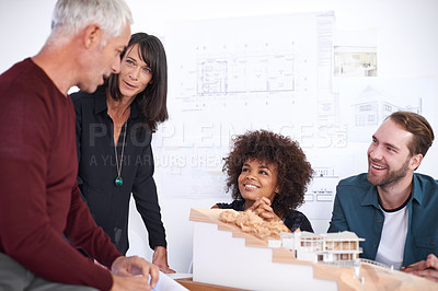 Buy stock photo Employees, meeting and model for industrial architecture, presentation and project layout for construction. Property developers or engineers with 3d graphic or design and remodeling from blueprint.