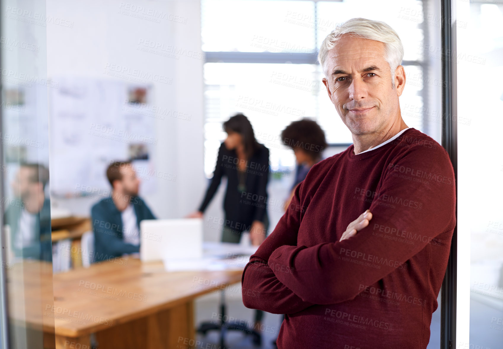 Buy stock photo Portrait, smile and businessman with team meeting, leader or ceo with colleagues. Happy, collaboration and design of building architecture for firm in office, designer and project management