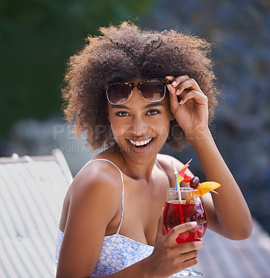 Buy stock photo Black woman, tropical and sunglasses with cocktail for portrait or summer vacation, relax or happy for wellness at resort. Holiday, retreat or natural female person with liquid or fruit drink