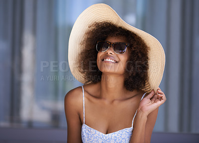 Buy stock photo Attractive ethnic female posing with her summer hat on