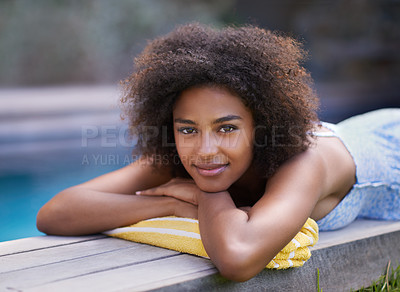 Buy stock photo Portrait, deck and black woman relax at poolside for travel,  break or chilling in a backyard on vacation. Face, smile and African female person at a wellness resort for resting on Thailand holiday