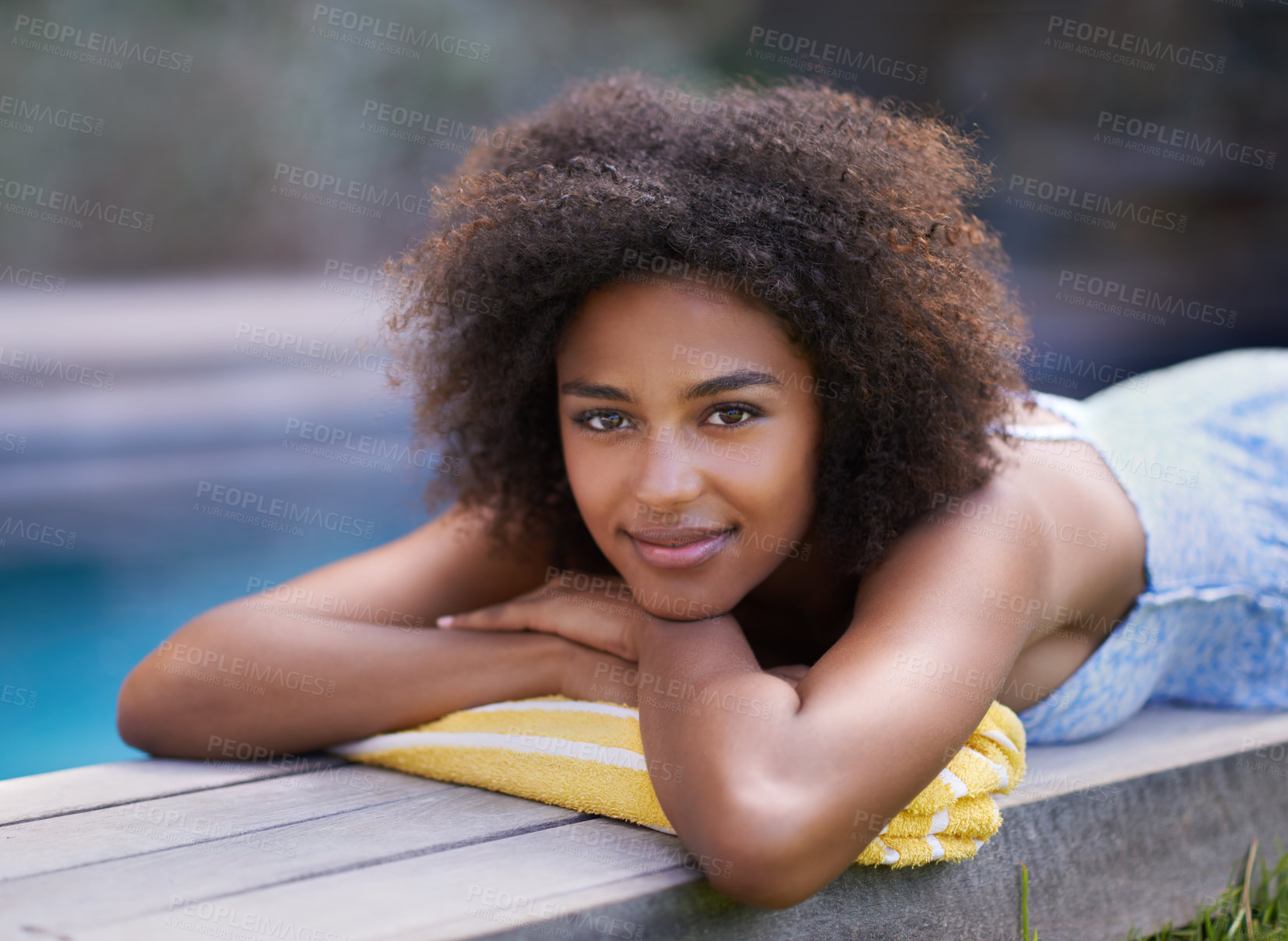 Buy stock photo Portrait, deck and black woman relax at poolside for travel,  break or chilling in a backyard on vacation. Face, smile and African female person at a wellness resort for resting on Thailand holiday