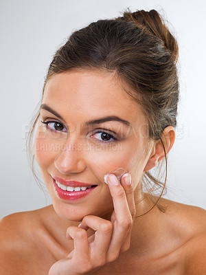 Buy stock photo Happy woman, portrait and skincare cream for beauty, cosmetics and antiaging treatment on white background. Self care, lotion or sunscreen for facial, face and healthy skin glow with makeup in studio