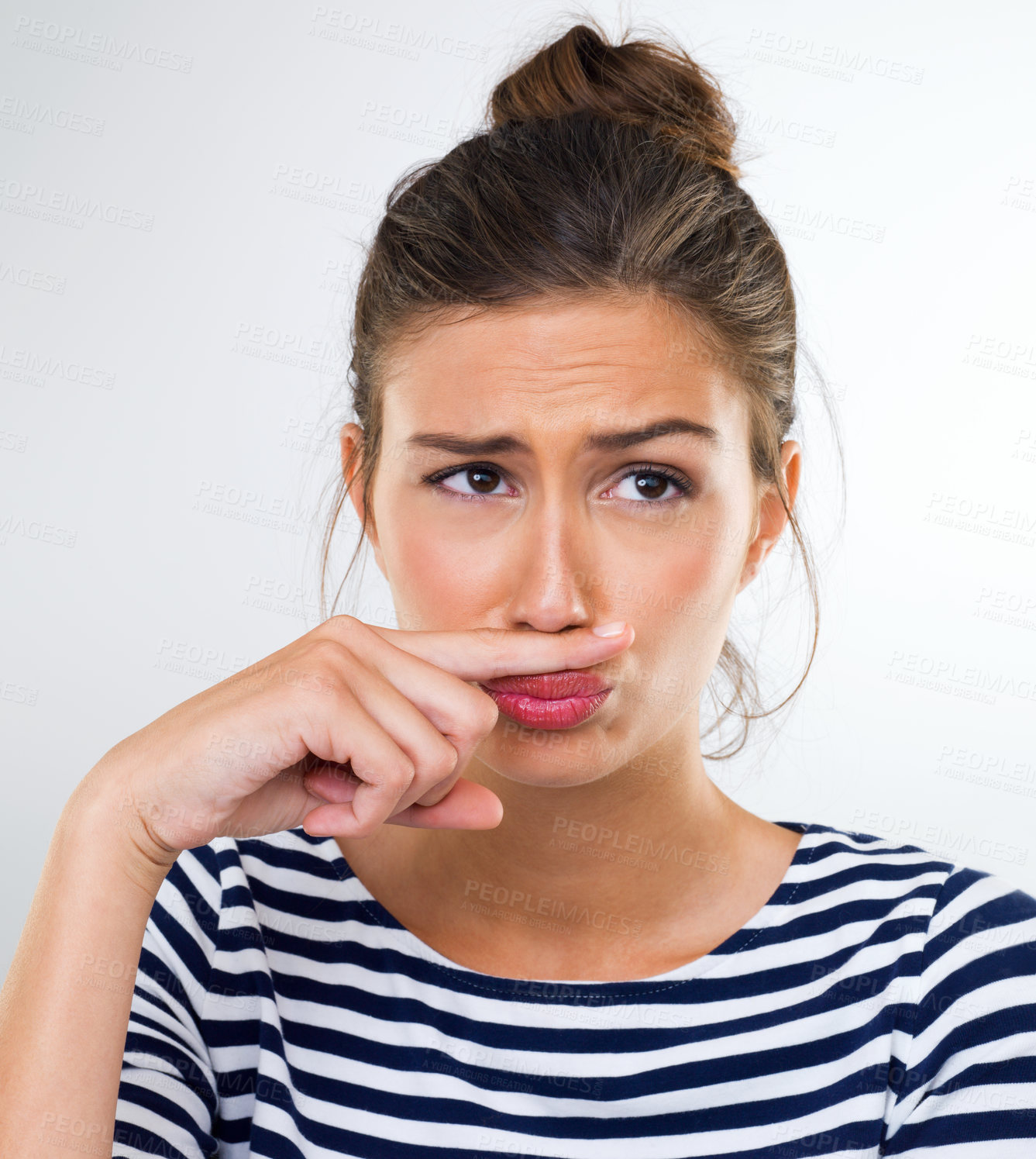 Buy stock photo Thinking, funny and finger moustache with woman, happy and person on a white studio background. Model, mockup space and girl with hand gesture and silly with expression and joke with comedy and goofy