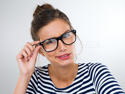 Buy stock photo Studio shot of a gorgeous young woman wearing glasses