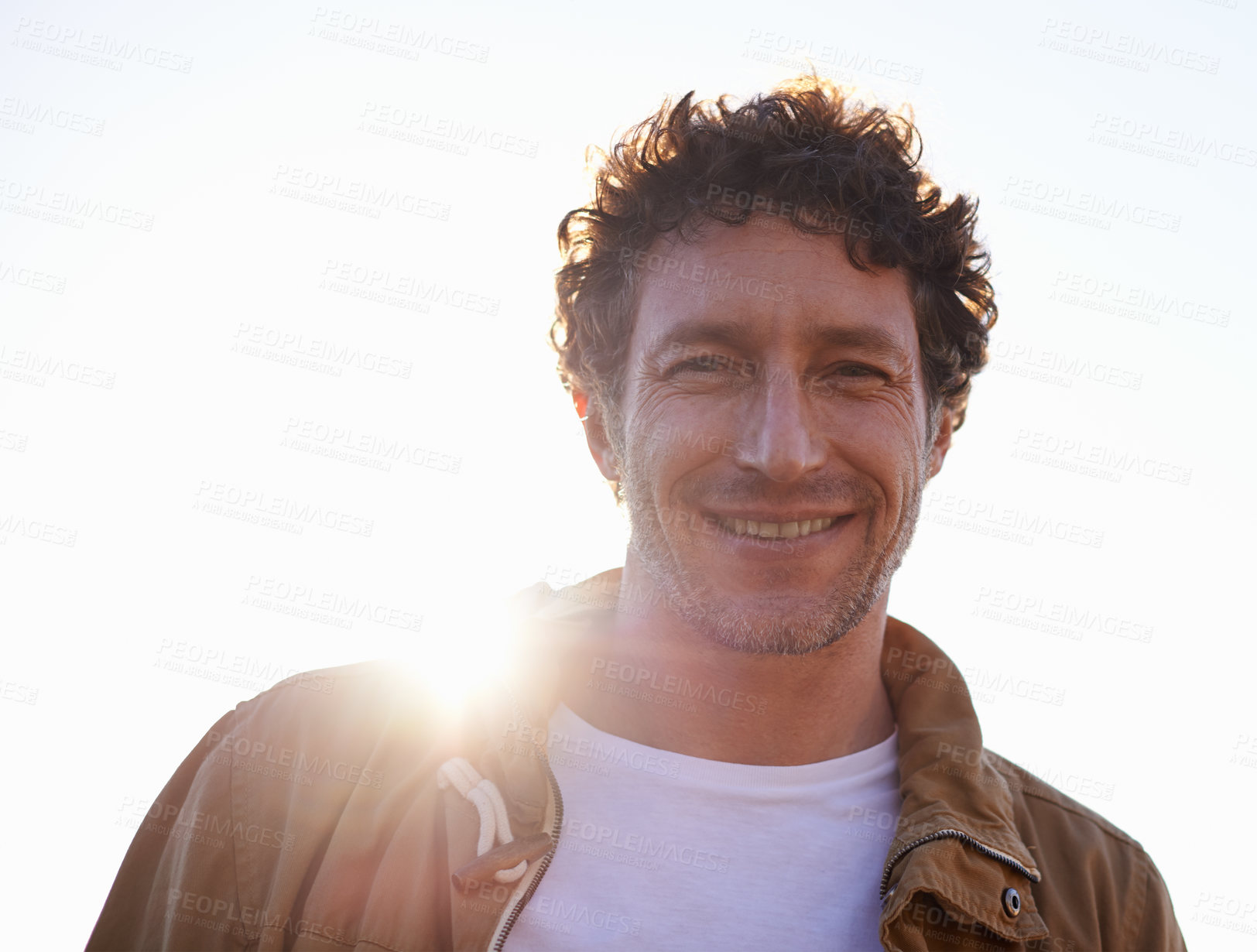 Buy stock photo A cropped portrait of a handsome man standing outdoors