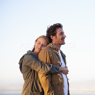 Buy stock photo Couple, hug outdoor and peace in park, love and support with date for bonding and time together. Sunset, nature and people with calm and fresh air, loyalty and commitment with smile for affection