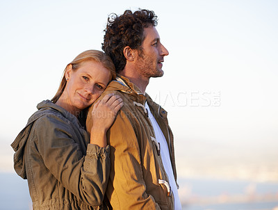 Buy stock photo Couple, hug outdoor and calm with love and support, date for bonding and time together. Sunset, nature and people with peace and fresh air, loyalty and commitment with trust, affection and embrace