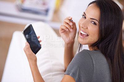 Buy stock photo Smile, portrait and woman on a sofa with phone for social media, search or online dating communication at home. Happy, face and female person in living room with smartphone app for google it or chat