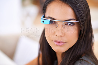 Buy stock photo Woman, portrait and serious with smart glasses in home for virtual reality, high tech information and digital eyewear. VR, person and futuristic vision for communication, research and mockup in house