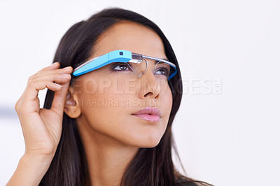 Buy stock photo Woman, face and confidence with smart glasses in home for virtual reality, high tech information or digital eyewear. VR, person or technology vision for communication, research or video call in house