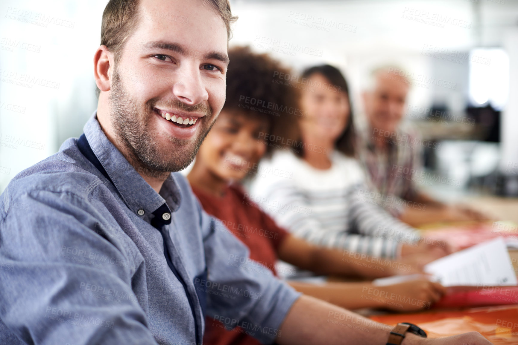 Buy stock photo Boardroom, portrait and man with smile for teamwork with colleagues, project and documents for working. Creative, male person and guy with happiness for career in company, employee and staff