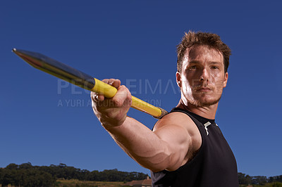 Buy stock photo Portrait, javelin and man with fitness, training and blue sky with sports and wellness with practice. Face, person and athlete with tournament and competition with exercise and workout with blue sky