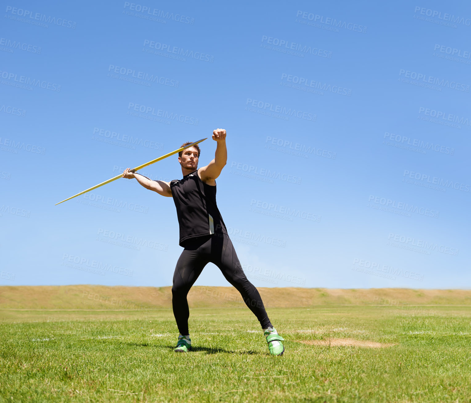 Buy stock photo Man, workout and javelin throw or sport competition on grass for athlete fitness or outdoor, strength or training. Male person, challenge and target strong or exercise performance, aim or wellness