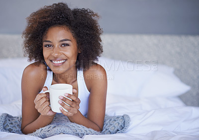Buy stock photo Portrait of a young woman enjoying a cup of coffee