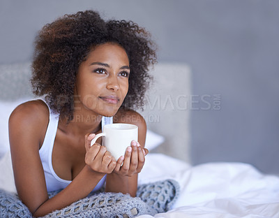 Buy stock photo Woman, happy and relax in bedroom with coffee mug, wellness and espresso on morning vacation on home. Young lady, inspiration and cup of tea on lazy weekend, break and peace on bed in cozy apartment
