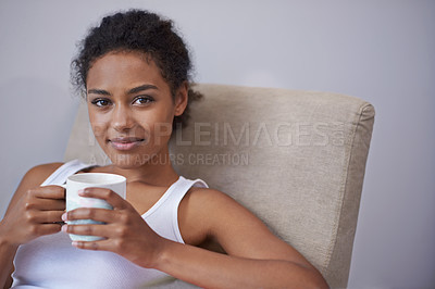 Buy stock photo Relax, portrait and calm woman with coffee on a chair for morning reflection, peace or insight in her home. Smile, face and female person with tea cup in a living room with rest, break or me time