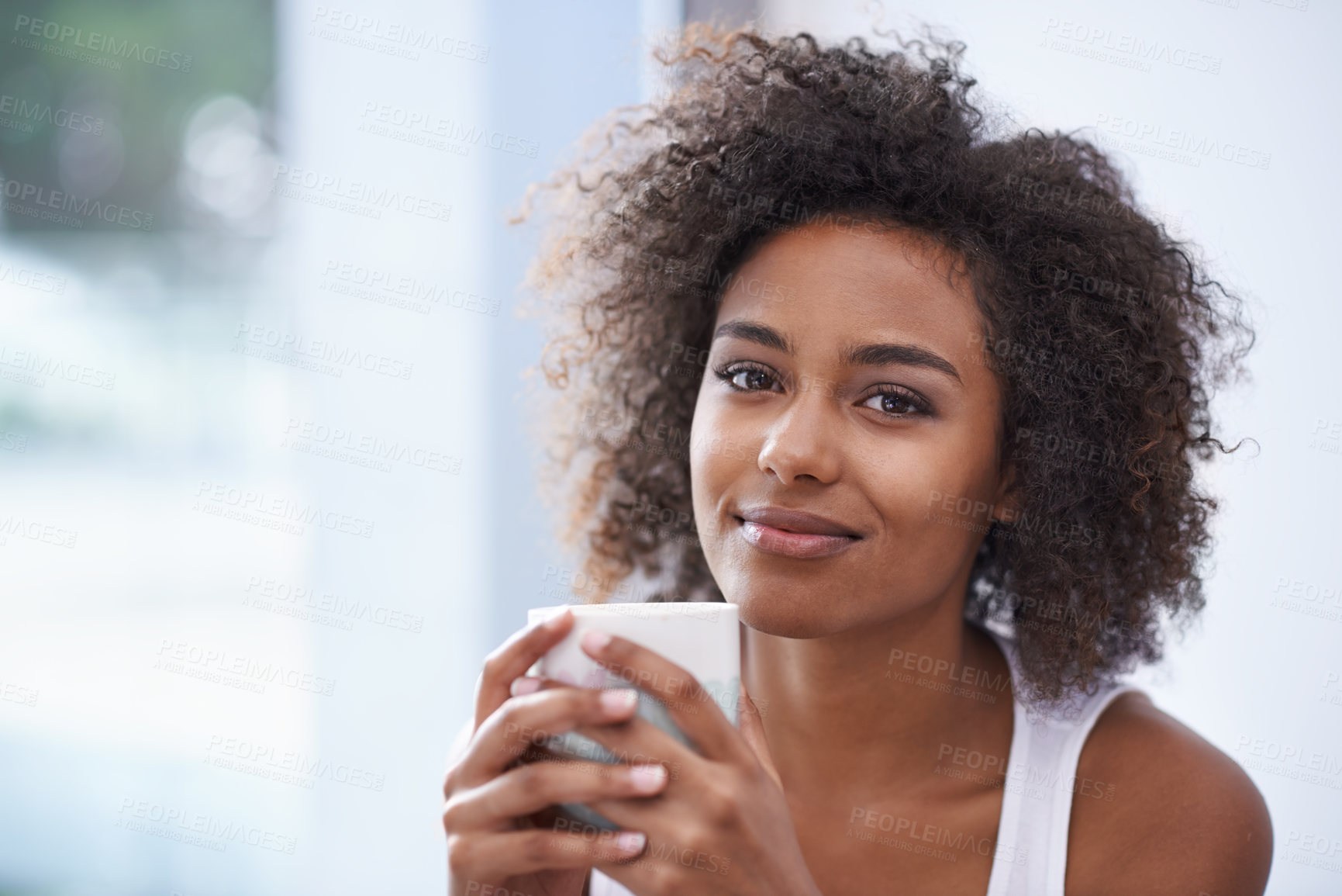 Buy stock photo Black woman, portrait and afro with coffee for morning, breakfast or hot beverage by window at home. Face of African female person with smile or caffeine for drink, latte or cappuccino at the house