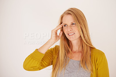 Buy stock photo Woman, stress and headache in studio, pain and depression or mental health on white background. Female person, migraine and frustrated with mistake or crisis, burnout and anxiety on mockup space