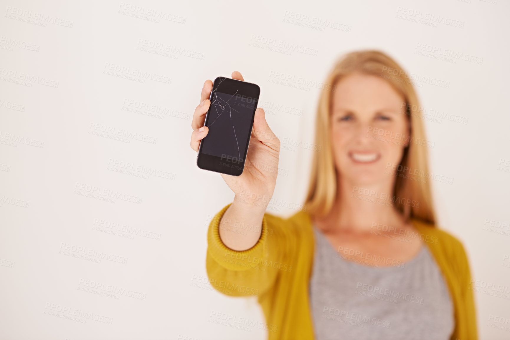 Buy stock photo Woman, hand and blank phone screen in studio portrait with smile for mock up space by white background. Person, smartphone and happy for ux, mobile application and show for communication on network