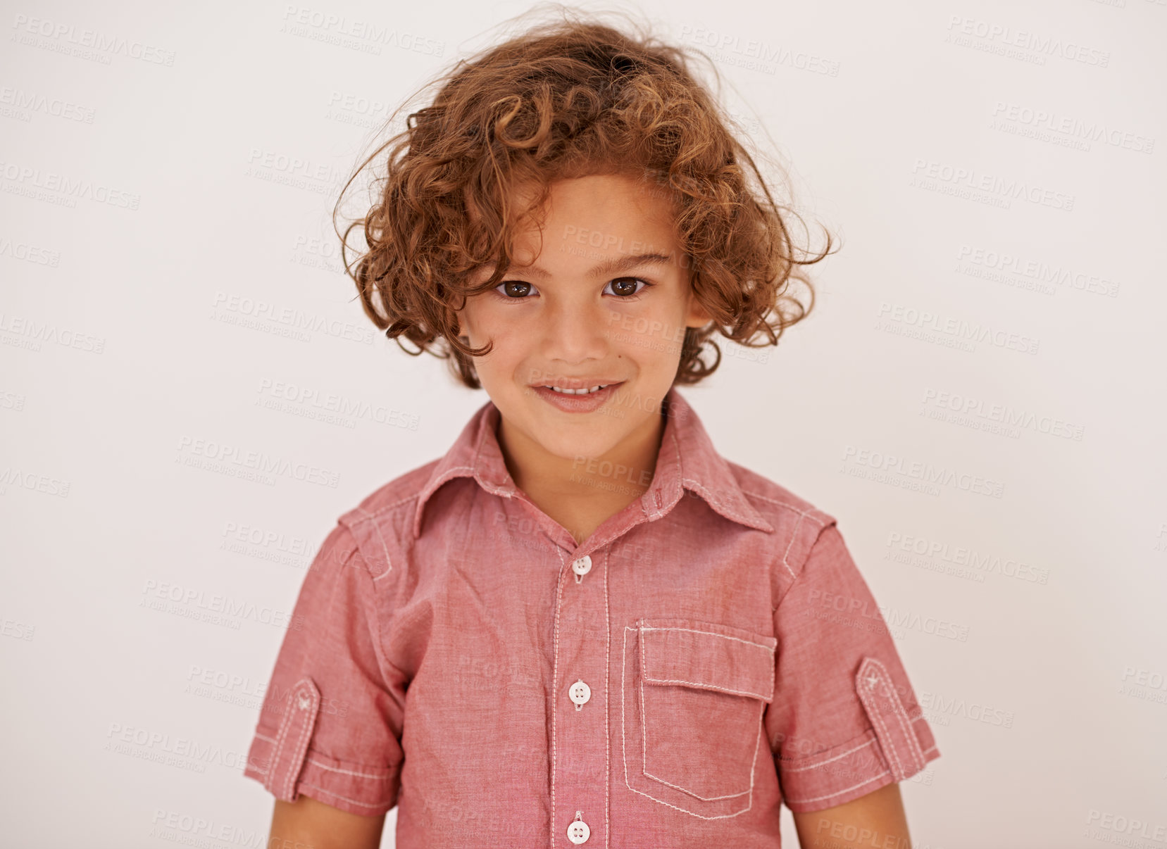 Buy stock photo Smile, fashion and boy child in studio with casual, trendy and cool shirt for outfit with curly hair. Happy, cute and portrait of adorable young kid model with style isolated by white background.