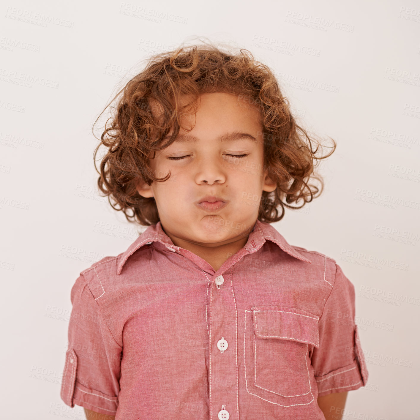 Buy stock photo Shot of a cute little boy holding his breath