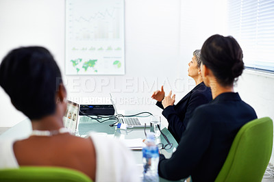 Buy stock photo Meeting, office and business people with statistics in discussion, talking and collaboration. Teamwork, corporate and women with chart, graph and research presentation for planning, review and growth
