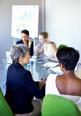 Buy stock photo Meeting, office and business women in discussion, talking and collaboration with statistics. Teamwork, corporate and women with chart, graph and research presentation for planning, review and growth