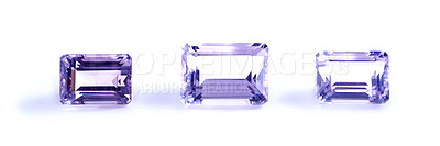 Buy stock photo Amethyst, stone or collection in studio by white background for natural resource, jewelry and baguette for luxury. Gemstone, purple crystal and closeup with shine, glow and brilliant cut for rocks