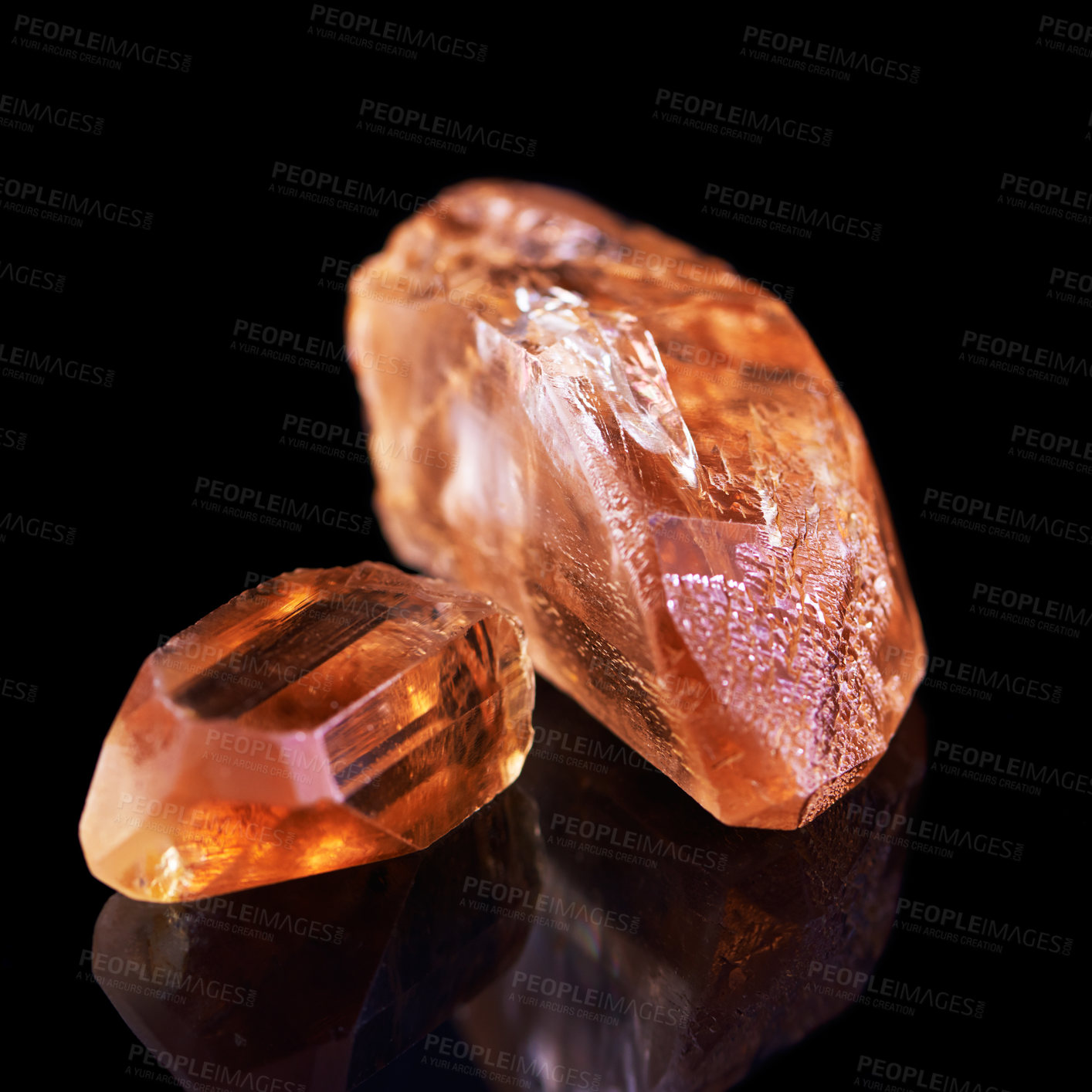 Buy stock photo Gem, rock and orange stone in studio with isolated black background for natural resource, shine and sparkle for luxury. Crystal, jewel and reflection in closeup for citrine, glow and mineral