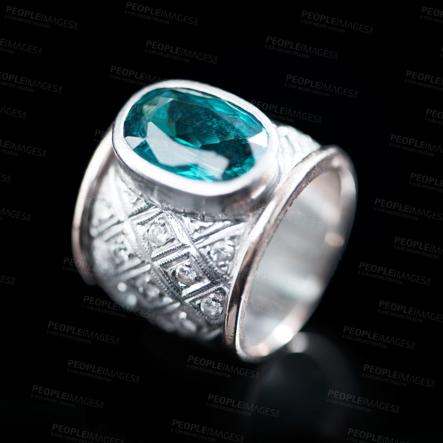 Buy stock photo Green, silver and ring on a black background for luxury gift, expensive and engagement or marriage in studio. Jewelry, diamonds and gemstone or rock in closeup with product texture and emerald color